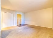 Thumbnail 10 of 22 - Carpeted interior entryway of unit