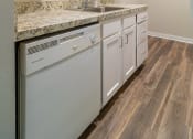Thumbnail 3 of 22 - Kitchen with ample white cabinetry