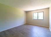 Thumbnail 5 of 22 - Living room with vinyl plank flooring