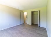 Thumbnail 6 of 22 - Master bathroom with plank flooring