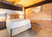 Thumbnail 25 of 40 - bedroom with nightstand, and lamp at Life At Agora, Cleveland