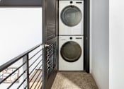 Thumbnail 27 of 40 - washing machine is in a small room at Life At Agora, Cleveland, 44103