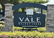 Thumbnail 15 of 18 - A sign for The Vale Walnut Creek is shown in front of a green tree.
