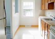 Thumbnail 2 of 31 - a kitchen with a sink and a window