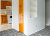 Thumbnail 5 of 31 - Living area with white shelving