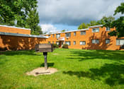 Thumbnail 34 of 35 - a grill in front of Arlen Terrace apartments