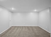Thumbnail 2 of 35 - an empty room with carpet and white walls