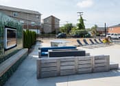 Thumbnail 35 of 56 - Outdoor Lounge With TV at Heritage Apartments, Ohio
