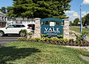 Thumbnail 2 of 18 - A sign for Vale Watercolor in front of a parking lot.