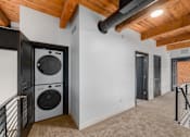 Thumbnail 17 of 40 - room with a washer and dryer at Life At Agora, Cleveland, OH
