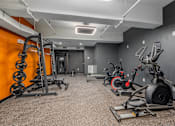 Thumbnail 33 of 40 - gym with a variety of equipment at Life At Agora, Cleveland, OH