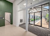 Thumbnail 36 of 40 - hallway with a green door at Life At Agora, Ohio