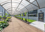 Thumbnail 38 of 40 - long, covered walkway at Life At Agora, Ohio