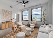 Thumbnail 4 of 40 - living room with two windows at Life At Agora, Cleveland, OH