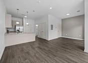 Thumbnail 20 of 58 - A spacious room with wood flooring and white walls. at The Lumos Apartments, Ohio