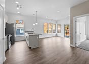 Thumbnail 34 of 58 - A spacious kitchen with a refrigerator, sink, and cabinets. at The Lumos Apartments, Ohio, 44106