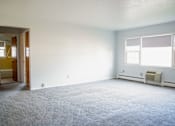 Thumbnail 6 of 20 - an empty room with a white wall and a window