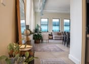 Thumbnail 10 of 35 - a living room with a view of a dining room and a kitchen at Market Square Place, Pennsylvania
