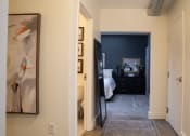Thumbnail 14 of 35 - a view of a bedroom from the hallway of a home at Market Square Place, Pennsylvania