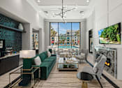 Thumbnail 26 of 46 - A Living Room with a Green Sofa at The Palmeri Residences, Florida, 34104