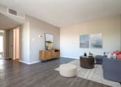 Thumbnail 14 of 33 - Renovated homes feature wood-style plank flooring at Acacia Gardens, Albuquerque
