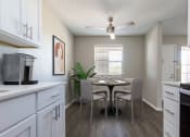 Thumbnail 12 of 33 - Beautifully renovated kitchen with Deluxe 2 finishes at Acacia Gardens, New Mexico, 87111
