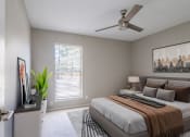 Thumbnail 13 of 33 - Bedroom with plush carpeting  at Acacia Gardens, Albuquerque, NM, 87111