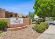 Thumbnail 32 of 33 - the gardens sign in front of a building at Acacia Gardens, Albuquerque, NM, 87111