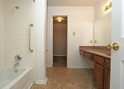 Thumbnail 21 of 31 - Bathroom with bath tub at Village Oaks Apartments, Austin