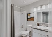 Thumbnail 5 of 12 - a bathroom with a shower toilet and sink at 2300 West Apartments, Reno, NV, 89502