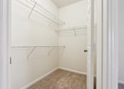 Thumbnail 8 of 23 - A spacious walk-in closet at the Ballantrae apartments in Florida