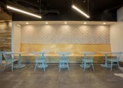 Thumbnail 30 of 52 - a table and chairs in front of a wood wall at 511 Meeting, South Carolina, 29403
