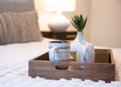 Thumbnail 4 of 52 - a tray with coffee cups and a vase on a bed at 511 Meeting, Charleston, 29403