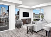 Thumbnail 6 of 28 - Living Area at Maven on Broadway Apartments, Rochester, MN