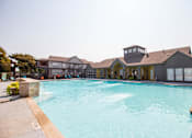 Thumbnail 17 of 27 - A Large Swimming Pool at Flats on Chapel Apartments, Waco, TX, 76712