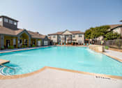 Thumbnail 18 of 27 - Outdoor Pool at Flats on Chapel Apartments, Texas, 76712