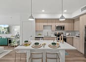 Thumbnail 3 of 46 - Kitchen Island With Pendent Lights at The Palmeri Residences, Naples, Florida
