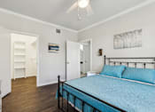 Thumbnail 6 of 27 - A Bedroom with a Dresser at Flats on Chapel Apartments, Waco, TX