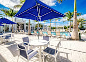 Thumbnail 17 of 46 - Poolside Tables at The Palmeri Residences, Naples, FL, 34104