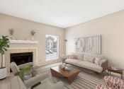 Thumbnail 1 of 14 - a living room with a couch and a fireplace