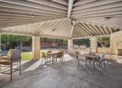 Thumbnail 7 of 31 - Poolside Patio with Outdoor TVs  at River Stone Ranch, Austin, TX, 78749