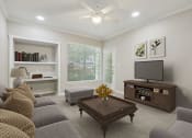 Thumbnail 2 of 23 - a living room with a couch and a tv