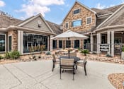 Thumbnail 31 of 35 - Outdoor Dining Table at The Lodge at Lakeline Village, Cedar Park, TX