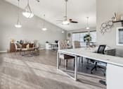 Thumbnail 10 of 18 - Leasing Center office with a long white desk and chairs at The Bay Club, Corpus Christi, 78418