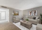 Thumbnail 3 of 33 - a living room with a couch and a coffee table at Acacia Gardens, Albuquerque, New Mexico