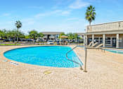 Thumbnail 11 of 18 - Swimming Pool And Relaxing Area at The Bay Club, Corpus Christi, Texas