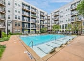 Thumbnail 8 of 22 - Pool Lounge Chairs at Glenwood at Grant Park Apartments, Atlanta
