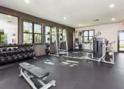 Thumbnail 20 of 30 - Fully equipped fitness center at Ashlar apartments in Fort Myers, Florida