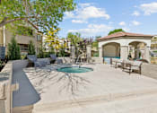 Thumbnail 21 of 27 - a pool and patio with chairs and a fountain at Altezza High Desert, New Mexico