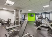 Thumbnail 19 of 23 - a gym with exercise equipment at Residences at Manchester Place in Manchester, New Hampshire